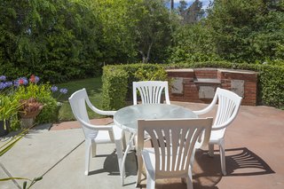 A back patio allows for outdoor dining.