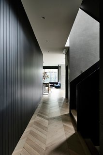A hallway with European Oak parquet floors.