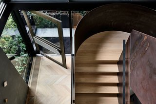 The steel staircase is one of the mansion's most unique features.