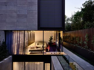 Part of the house is embedded under the lush, landscaped garden.
