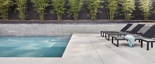 In addition to the limestone and Shou-sugi-ban, the exterior walls are made of natural stucco.