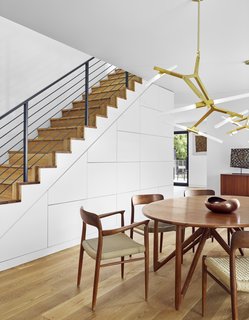 A catalyzed finish has been used for the cabinetry under the stairs.
