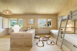 Bunk beds outfit the children's bedroom.