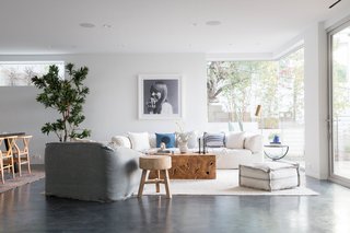 Custom wood millwork, polished concrete floors, and some exposed concrete were used for the interiors. 