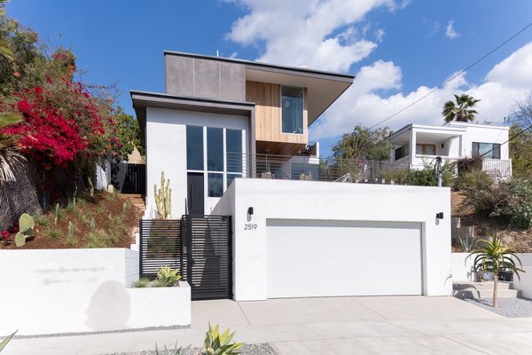 Reinforced concrete was used for the retaining walls and slabs along all grades, while wood framing with steel framing beams were used at cantilevered areas.