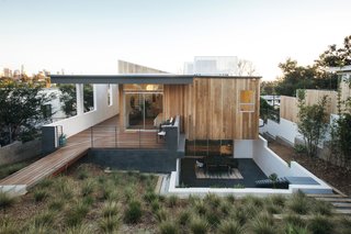 "We wanted to ‘cap’ the dwelling with a generous, almost sweeping canopy that would keep the majority of the high sun exposure areas in shade," says Pande. "We also played with the roof volume to break free from the constraints of a typical ‘box modern’ home."