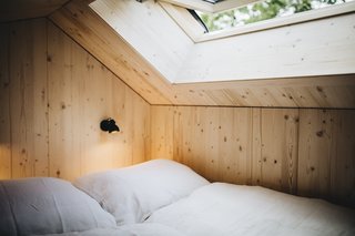 The lofted bedroom features a king-size Casper Mattress, and a skylight window that allows for idyllic stargazing at night. 