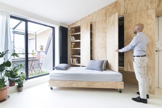 One of the walls hides a pull-out sofa and a wardrobe.