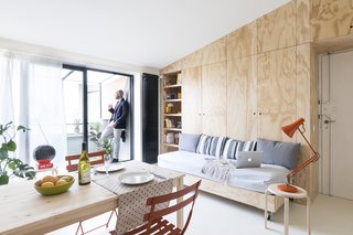 White resin has been used for the flooring in the living room.