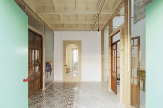 Vibrant tiles from Mallorca concrete tile brand Huguet were used for sections of the floor.