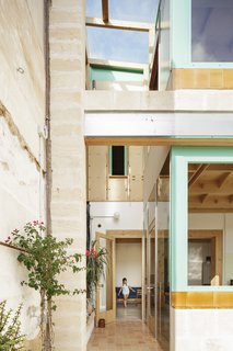 Special terra cotta tiles from Miquel Soler, a traditional tile company from the small town of Felanitx in the southeast corner of Mallorca, were used for sections of the facade and pool.