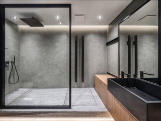 The glass dividers in the bathroom are hand-crafted by Ukrainian craftsmen.