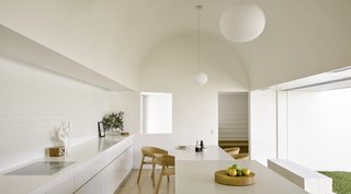 The owners' minimalist sensibilities informed the aesthetics, which have been guided by an elegant, bleached palette and stripped-back surfaces.