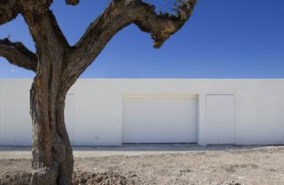 A discreet, white garage door.