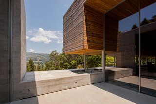 A sheltered hot tub outdoors.