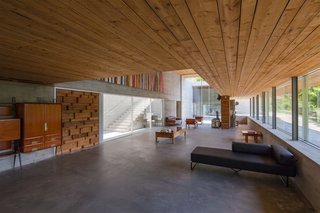 The leather sofas in the living area are designed by Brazilian designer Jose Rodrigues. 