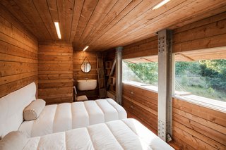 Two single beds in one of the guest bedrooms.