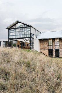 Exposed steel, concrete soffits, and cement-washed bricks were been chosen as key components of the home due to the materials having low-maintenance, yet being extremely durable. 