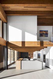 Family and friends can gather around a large U-shaped island in the kitchen.