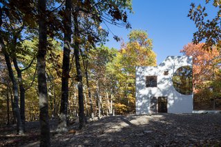The Ex of In House is surrounded by 28 acres of forest. 
