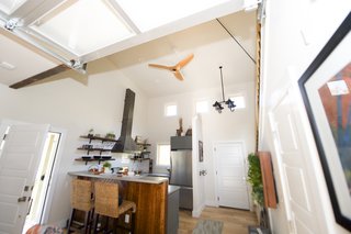 A "Big Ass Fan" smart fan with motion detector.