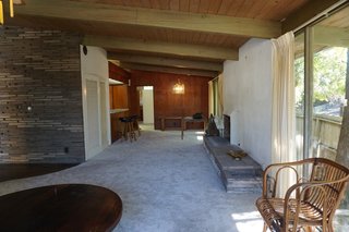 The house is located in the Santa Monica mountains. It was built in 1958, along with a carport and a boomerang-shaped pool.