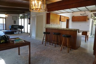 The design team polished and sealed the original concrete slabs and removed the old carpeting and tiles.