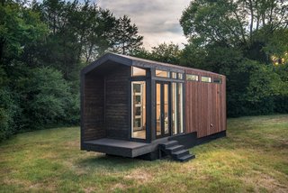 To protect against water penetration, the walls and roof are assembled with three-quarter inch pressure-treated OSB sheathing, Typar housewrap, an ice and water shield, asphalt paper, furring strips, and stained penofin cedar.