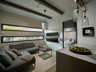 A lounge area leads to the master bedroom.