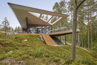 Steps leading up from the lake to the living area.