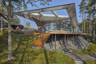 The Wave House seamlessly combines solid timber with glass.