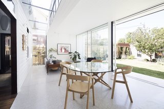 "The glazed link acts as a formal break and allows the original exterior cladding to be restored and preserved internally," says Ong. 
