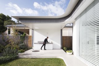 An outdoor barbecue and sink near the garden makes for easy entertaining.