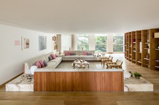 Pascali Semerdjian designed the sofa and bookcase, while Sergio Rodrigues designed the armchairs.