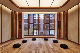The windows have custom screens made from walnut. 