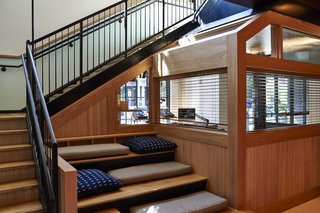 The stepped seating area adjacent to the radio station creates a community feel and encourages a multi-layered social experience.