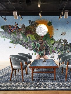 The "Wild Days" space is defined by a black painted ceiling and a massive custom mosaic.