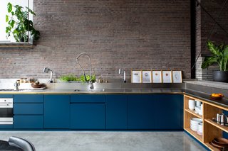 Vibrant blues brighten up the kitchen.