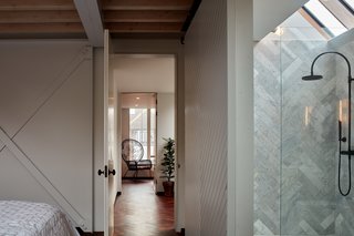 A bedroom with an ensuite bathroom.