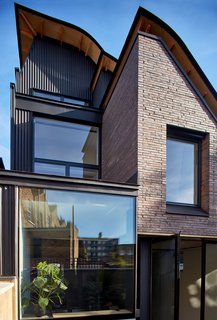 The back of Makers House features large amounts of glazing.