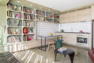 The Gomez Apartment reflects the owner’s personality and career in illustration while sparking his creativity.