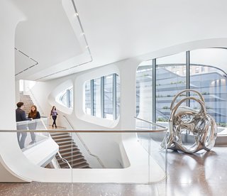 520 West 28th abuts the High Line, further expressing the city's relationship with this reinvented urban and civic space in Chelsea. Designed with split levels expressed within a handcrafted, steel facade of interlocking chevrons, this 11-story residential apartment building carries with it the spirit of Chelsea’s industrial past.