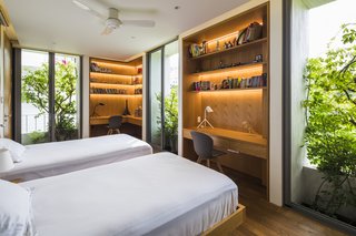 One of the bedrooms on the first floor has two study nooks.