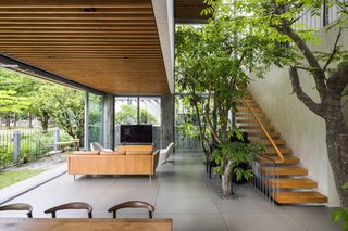 The living and dining area on the ground floor open up to a terrace.