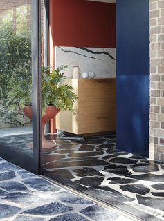 The design team reduced the size of the garage to allow for a larger kitchen.