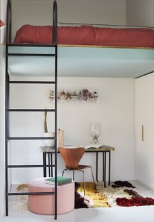 A study area with a lofted bed.
