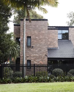 The sturdy brick home was designed by Australian midcentury architects Payne & Hunt.