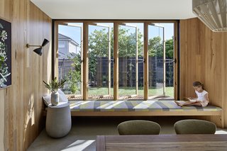 When the casement windows are opened, family members can bask in sunlight while reading a book indoors.
