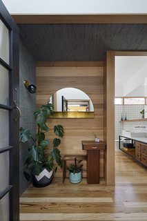 Wood floors and walls warm up the interiors.