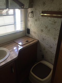 The renovation updated the old wallpaper in the bathroom.
